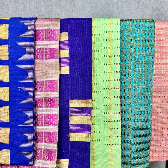 Aso oke fabric swatches showing different colors and weaving patterns